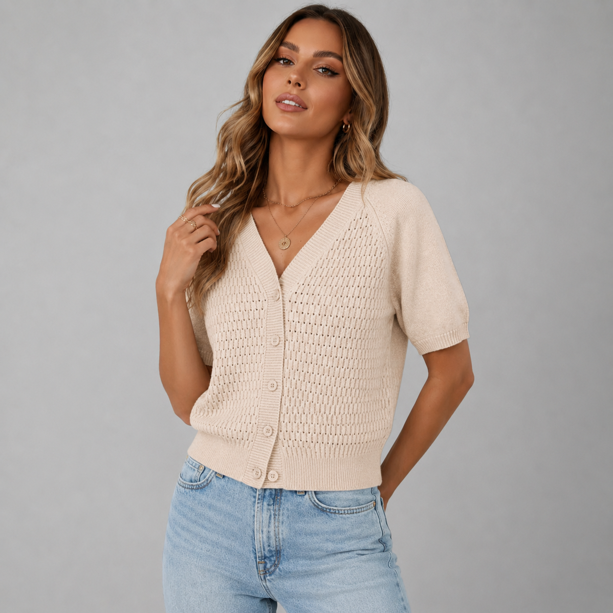 Cropped Knit Cardigan with V-Neckline and Puff Sleeves