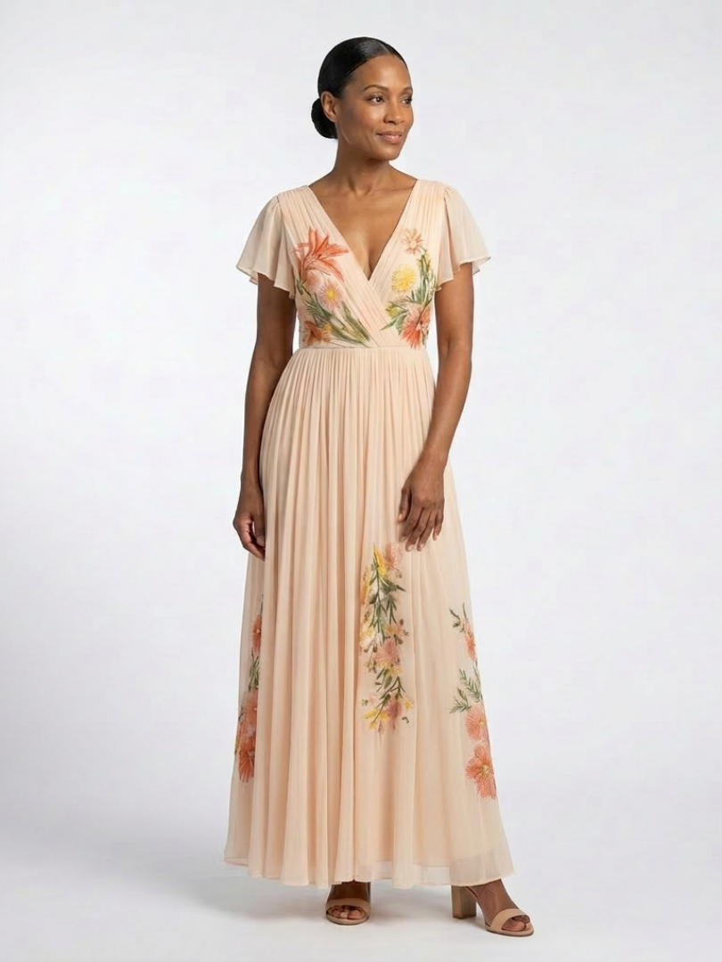 Elegant Pleated Maxi Dress with Flutter Sleeves and Placed Floral Print