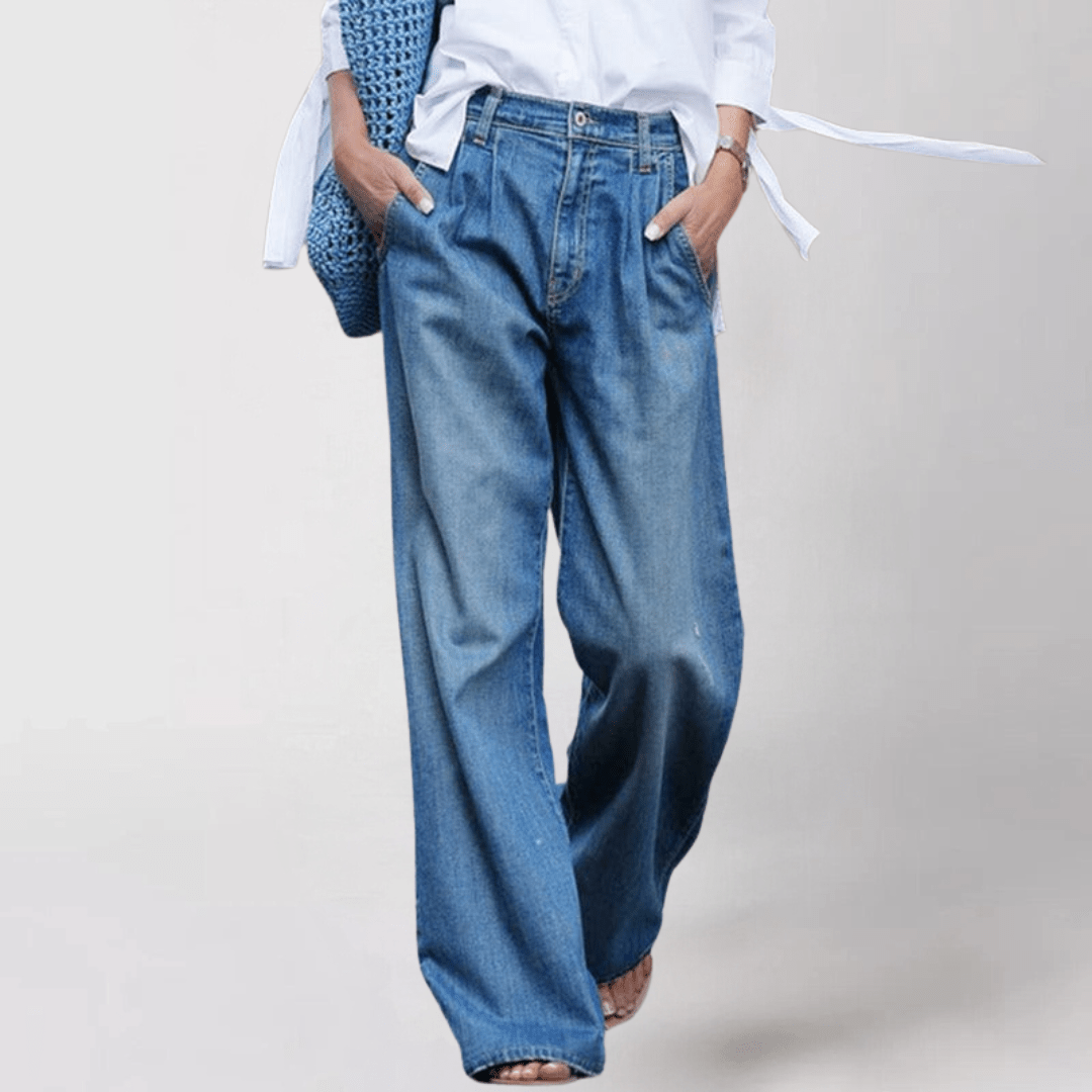Polished High Waisted Wide Leg Jeans with Front Pleats and Fluid Drape