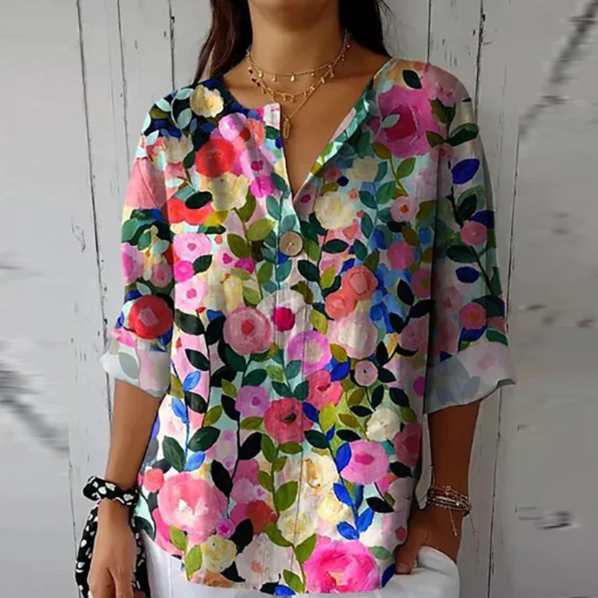 Relaxed Floral Print Blouse with V-Neckline and Three Quarter Sleeves