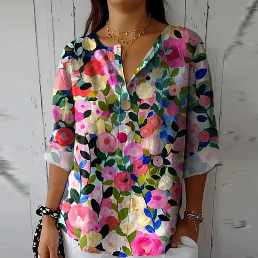 Relaxed Floral Print Blouse with V-Neckline and Three Quarter Sleeves