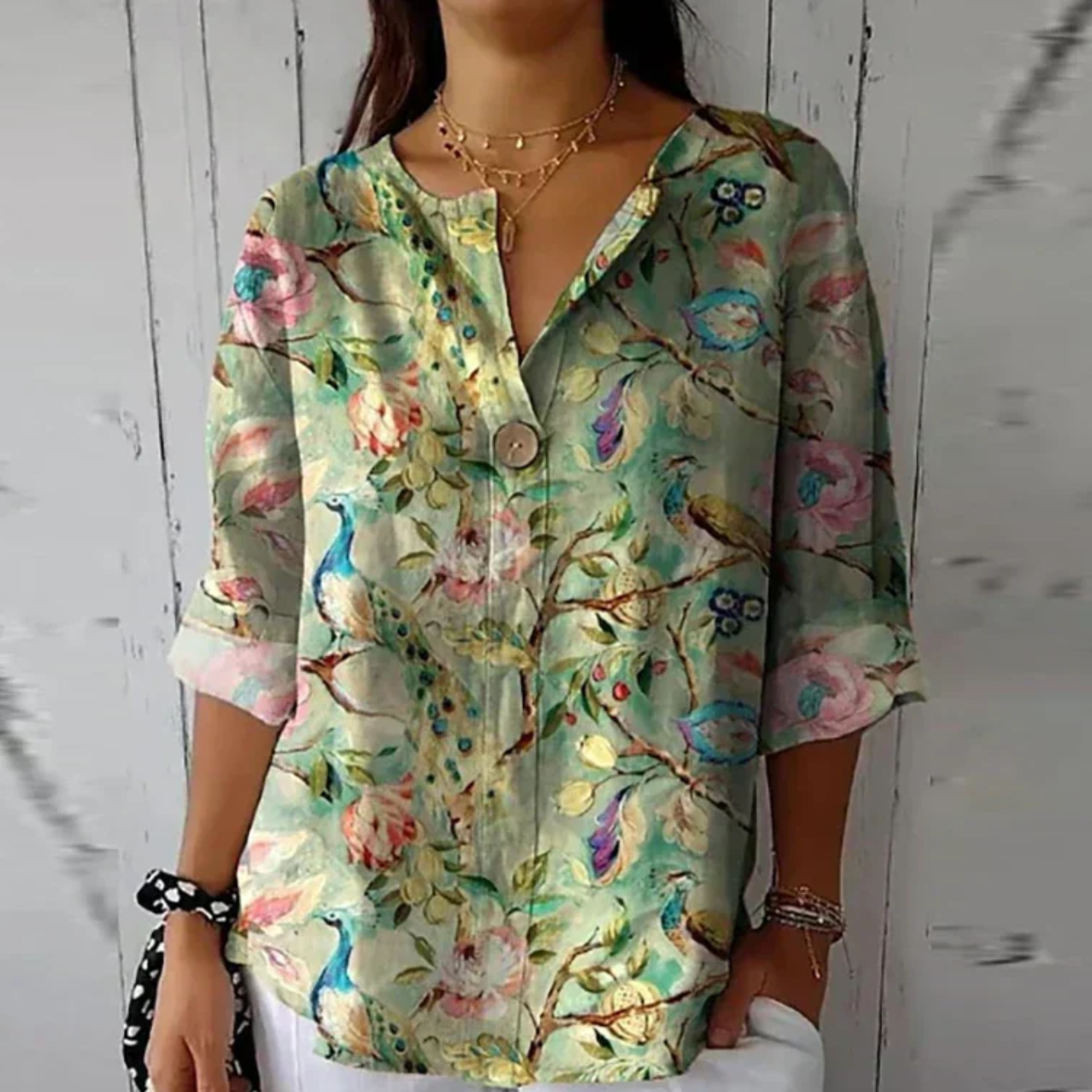 Relaxed Floral Print Blouse with V-Neckline and Three Quarter Sleeves