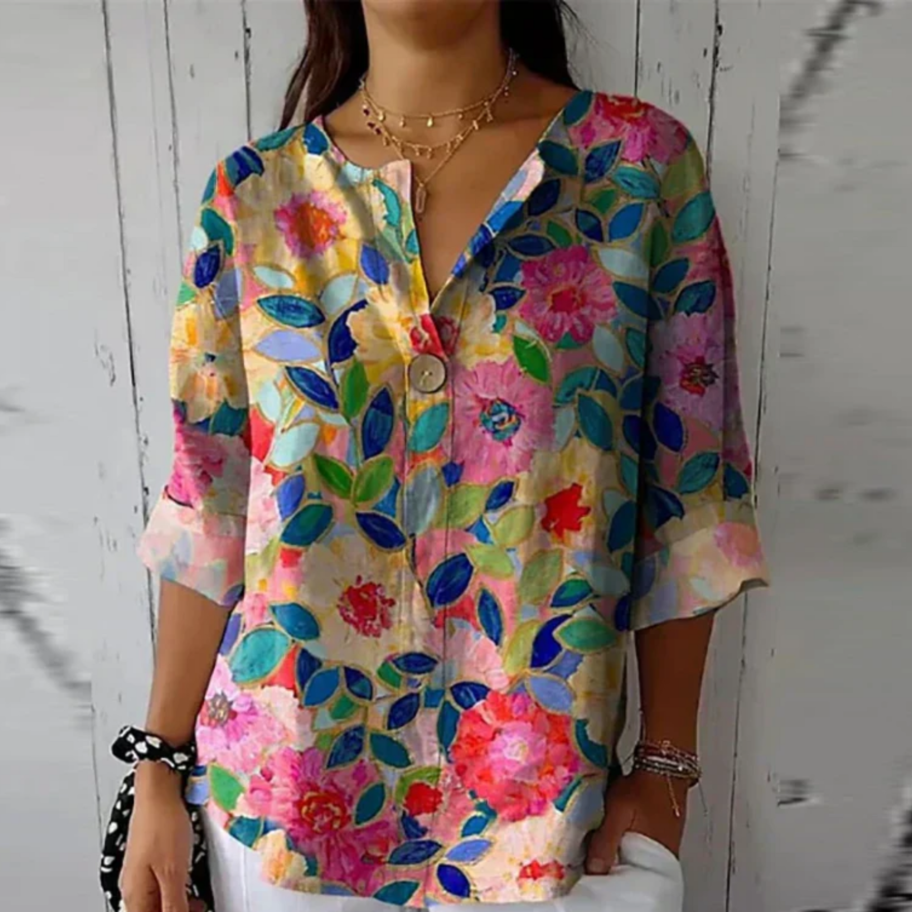 Relaxed Floral Print Blouse with V-Neckline and Three Quarter Sleeves