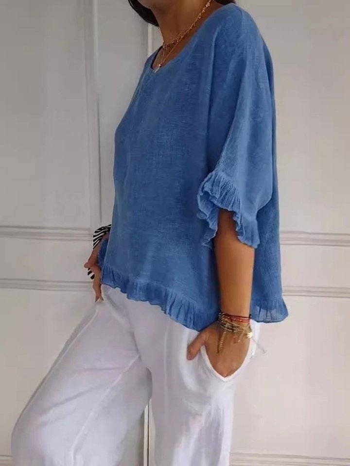 Relaxed Linen Blouse with Ruffle Hem and Half Sleeves