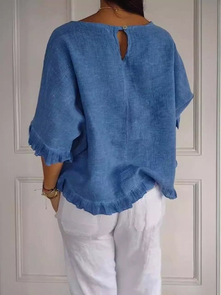 Relaxed Linen Blouse with Ruffle Hem and Half Sleeves