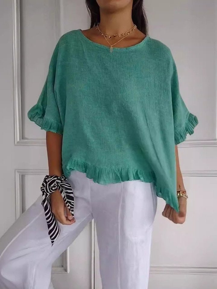 Relaxed Linen Blouse with Ruffle Hem and Half Sleeves