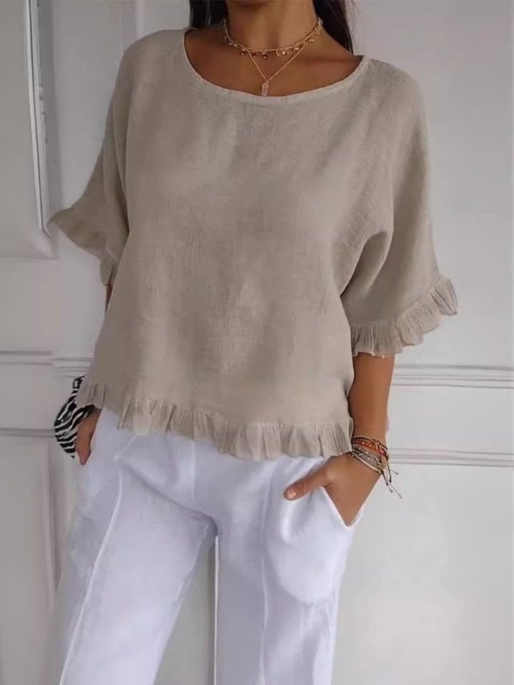 Relaxed Linen Blouse with Ruffle Hem and Half Sleeves