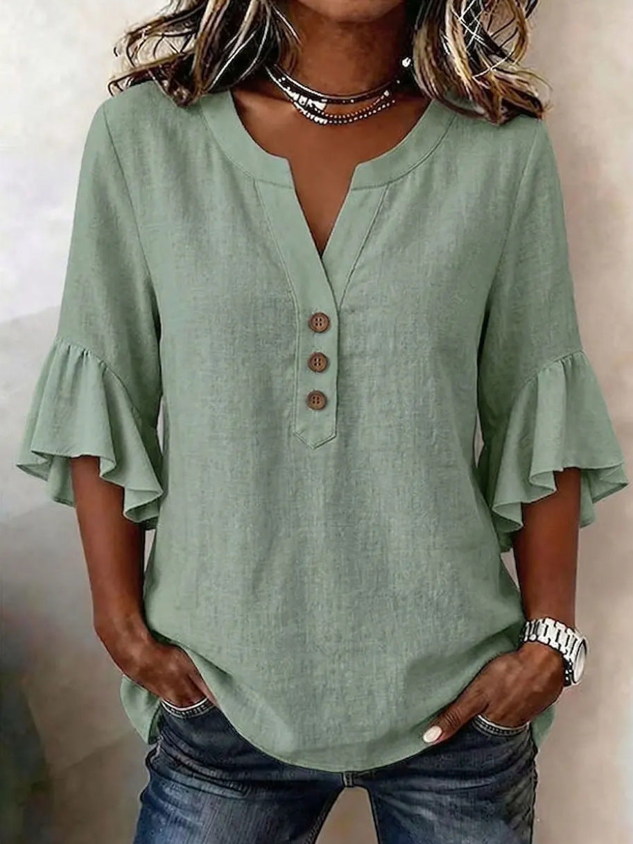 Relaxed Linen Blouse with Ruffle Sleeves and Button Neckline
