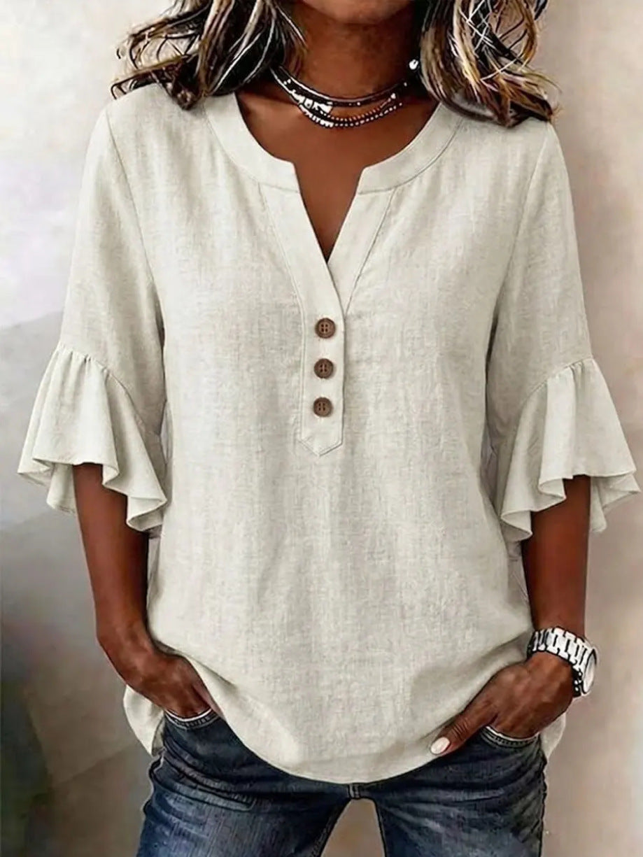 Relaxed Linen Blouse with Ruffle Sleeves and Button Neckline