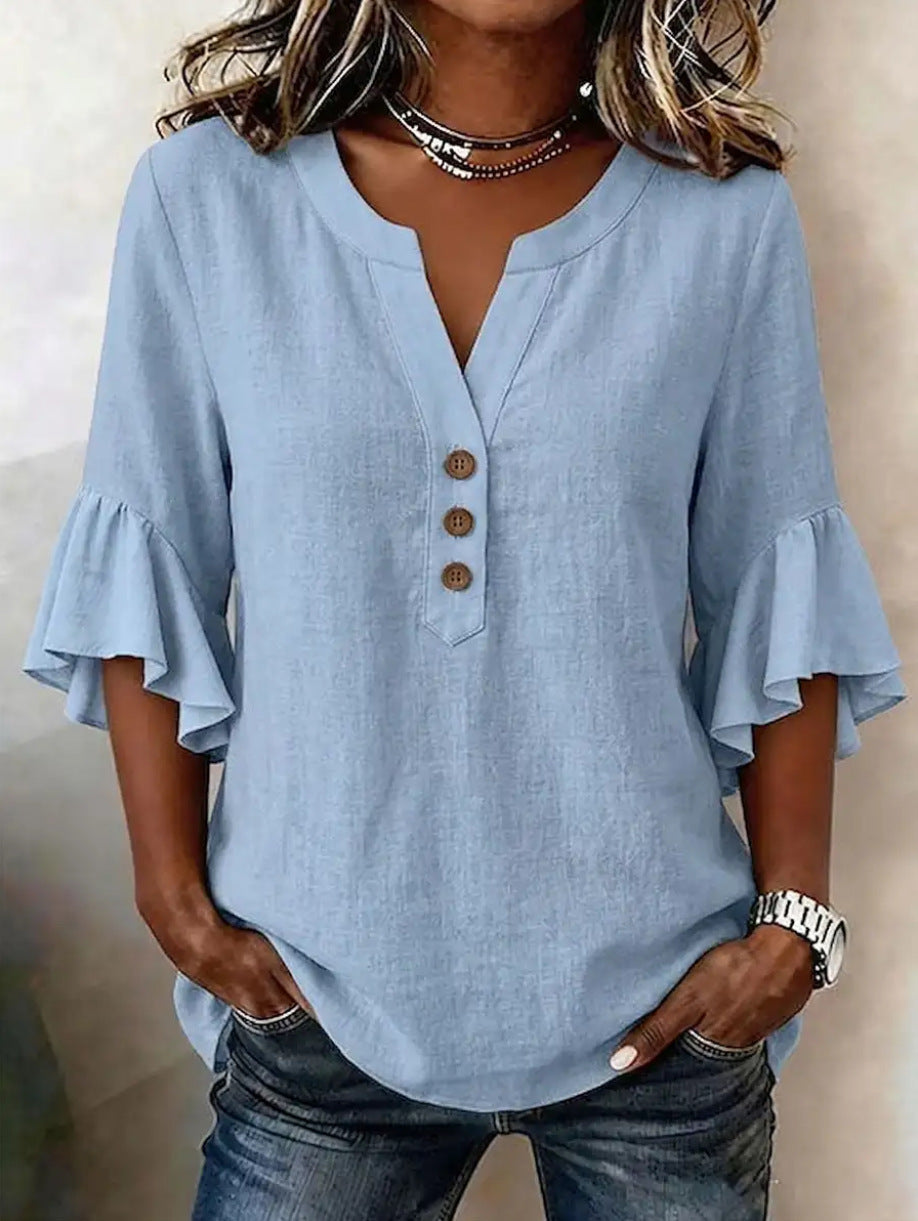 Relaxed Linen Blouse with Ruffle Sleeves and Button Neckline