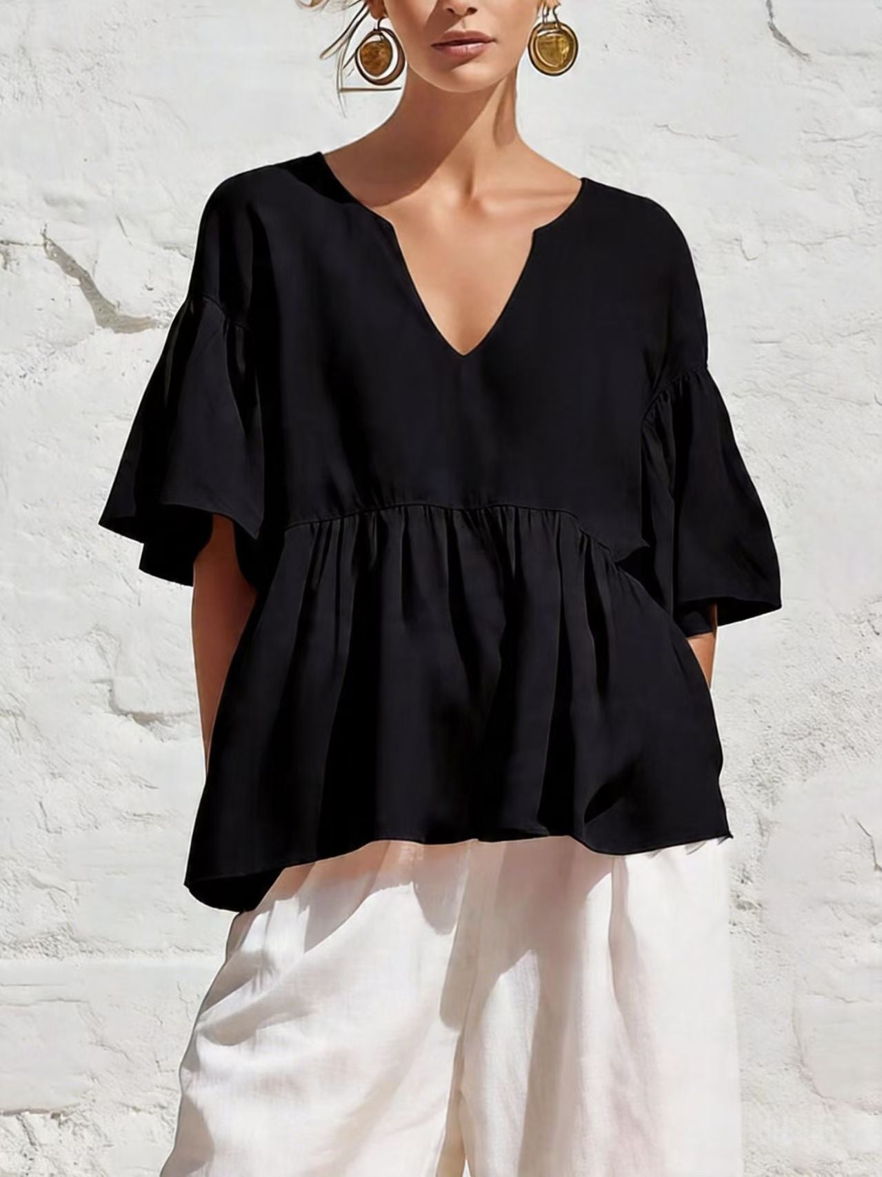 Relaxed Ruffle Hem Blouse with V-Neckline and Flutter Sleeves