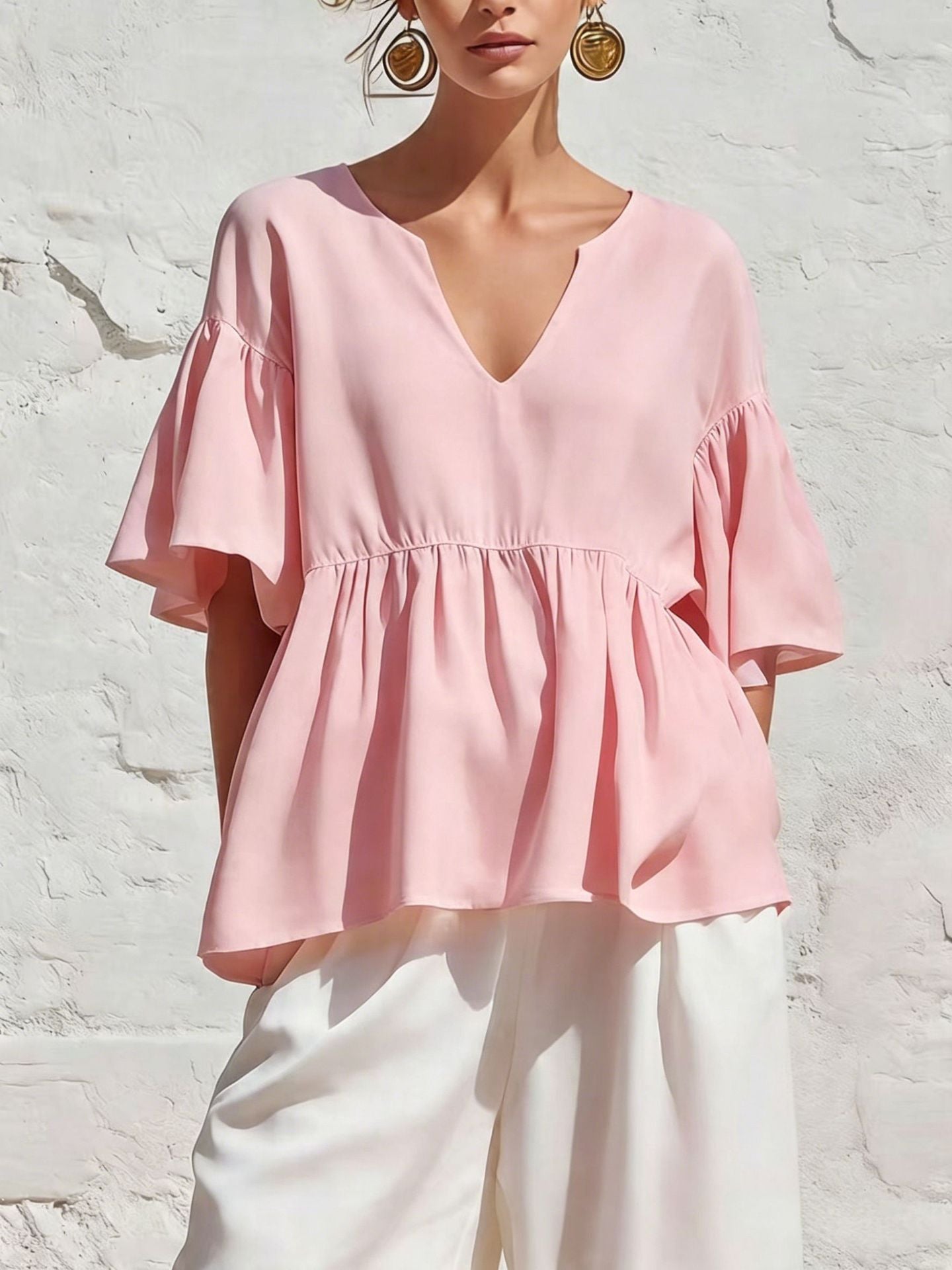 Relaxed Ruffle Hem Blouse with V-Neckline and Flutter Sleeves