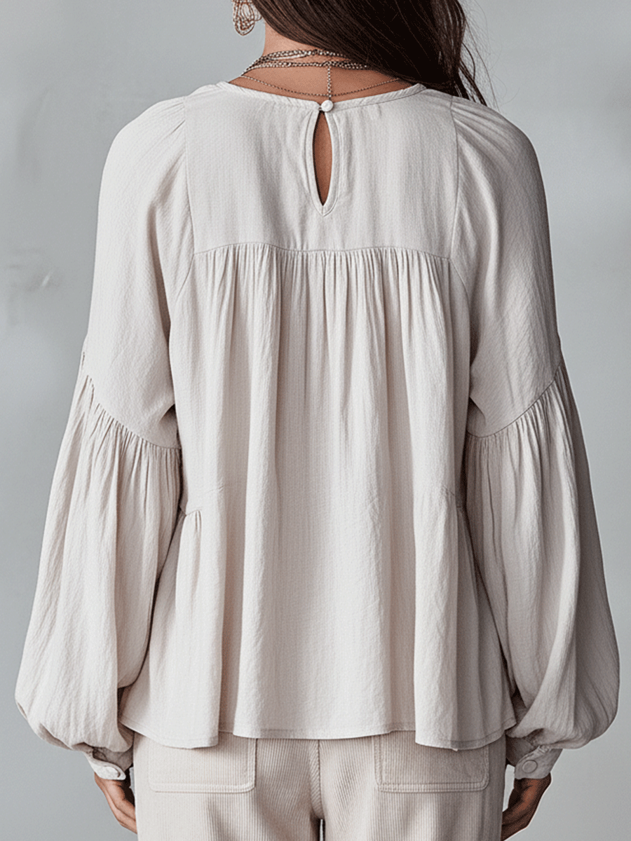 Relaxed Tiered Blouse with Ruffle V-Neckline and Puff Sleeves