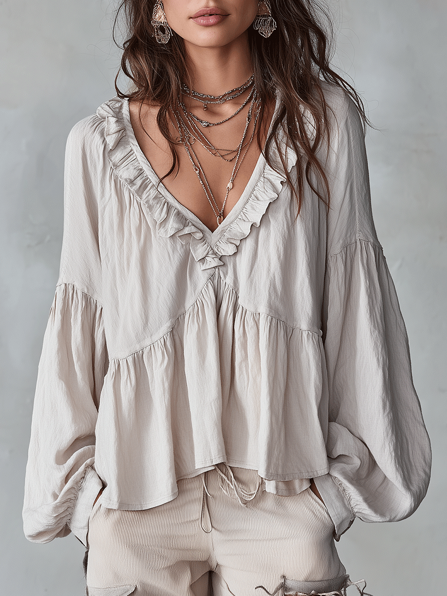 Relaxed Tiered Blouse with Ruffle V-Neckline and Puff Sleeves